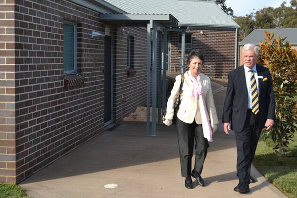 • HOME SWEET HOME: Member for Goulburn Pru Goward and Baptist Community Services CEO Ross Low inspect the new BSC Clinton Place development, which features 33 community housing units.