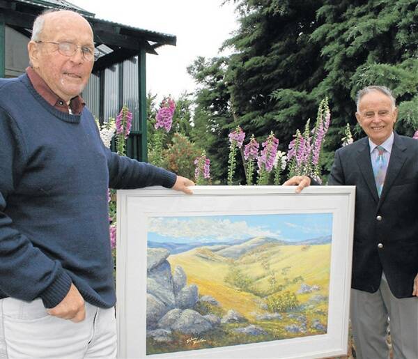 CAMPAIGNERS: Former state independent MP John Hatton (right) presented his good friend John Edlund with an oil painting he did in gratitude for his service as a NSW police officer and corruption fighter.