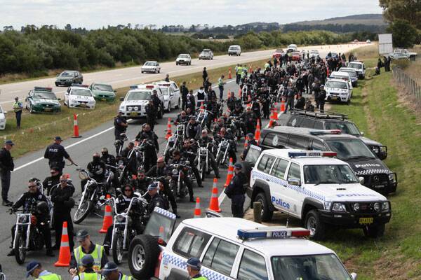 POLICE kept a close eye on a large group of Rebels Motorcycle Club riders as they streamed through Goulburn on Saturday. Photos courtesy of  NSW Police Media.