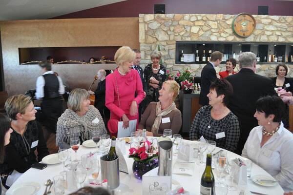 SAYING HELLO: Special ConnectPink launch guest Governor-General Quentin Bryce chats with Goulburn women Belinda Zantis (slightly obscured), Natasha Barber, Maree Peden, Kim Stamatellis, Jacki Waugh and Jodie Divall. Photo: Gerard Walsh 