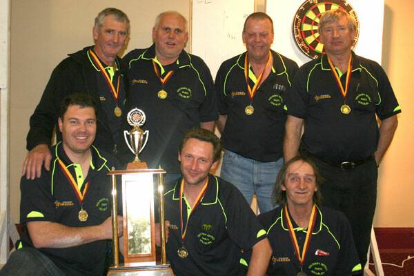 CHAMPIONS: Proudly holding their trophy are Steve Norris and Ian wells with Trevor Bennett also in front. Behind are John Chandler, Robert Corey, Greg Cant and Paul Koppe.