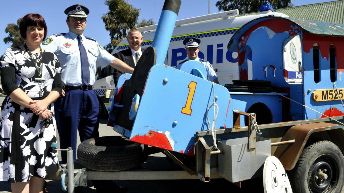 Council's Museum Officer - Water Works Julianne Salway, acting Local Area Commander Evan Quarmby, Mayor Geoff Kettle and Goulburn Police crime manager Detective Inspector Chad Gillies welcome back Thomas the Tank Engine.