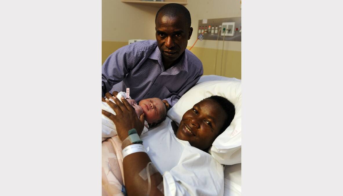 Stephanie and Ettiene Murekezi with their baby girl, Kim, born in Horsham. Baby Kim is the family’s  13th child. Picture: Paul Carracher.