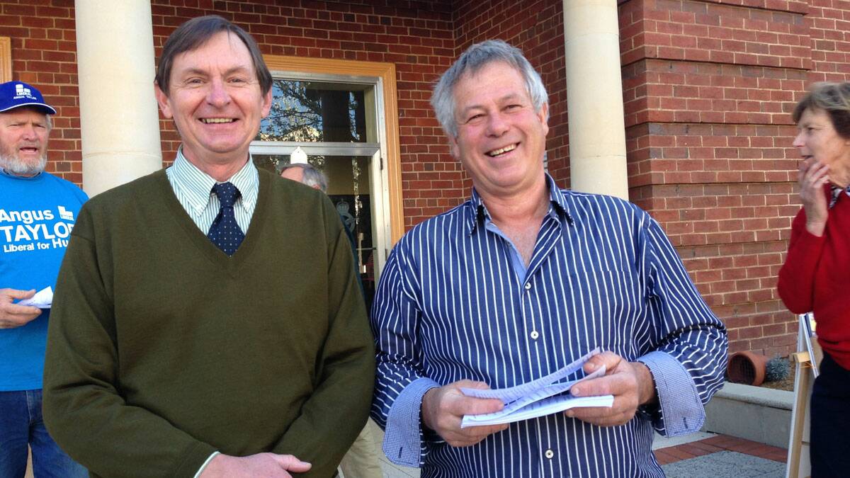 James harker-Mortlock (IOndependent candidate for Hume) and Bernie Johnson vote at Yass Memorial Hall. Photo KARAN GABRIEL - Yass Tribune.