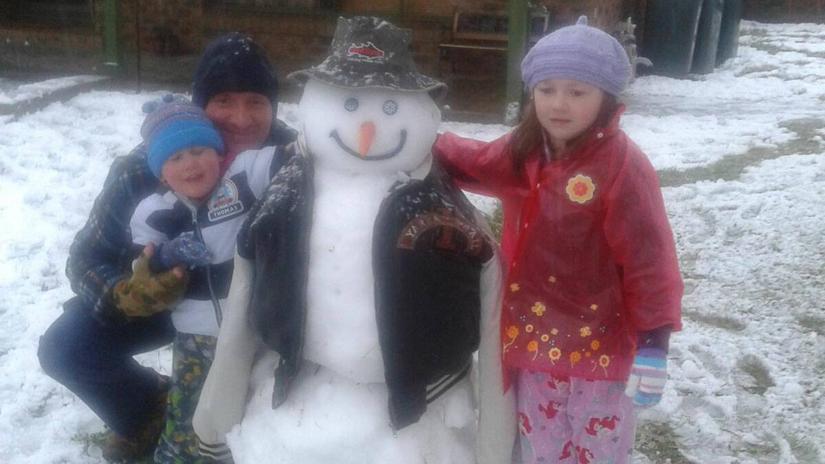 Steve Apps is a great dad and loves playing with his kids. This is a snowman they built together in August 2012.