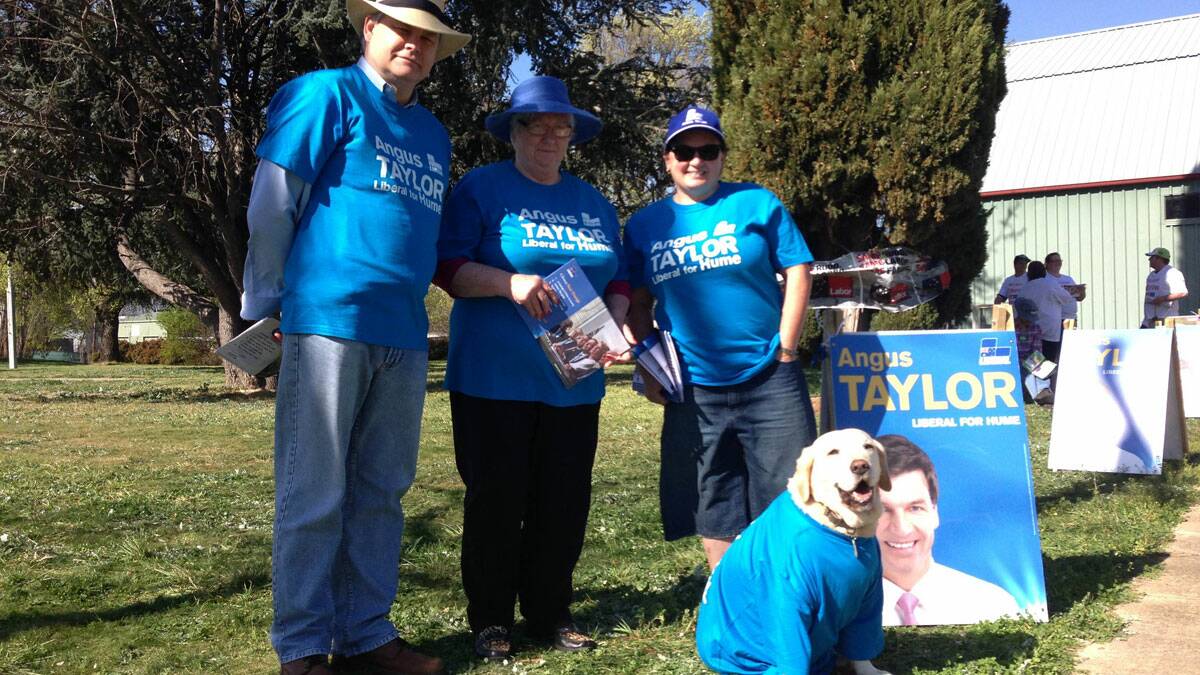 Liberal volunteers Stephen Hart, Faye Long and Melissa Alsop with her rescue dog Barry. Photo BRITTANY MURPHY.