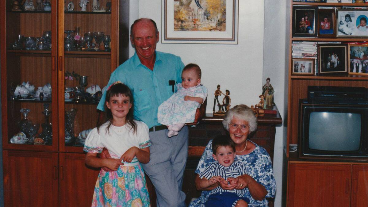 Ronnie Penning .... a pleasantly distracted dad with Babs in 1991 and their 3 grandkids (they now have 7).