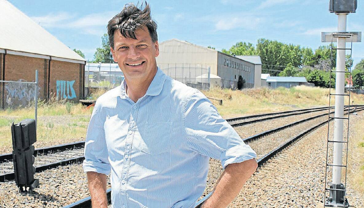 GET REAL: Liberal candidate for Hume Angus Taylor has criticised a mooted trial of B-triples on the Hume Highway, saying the real answer is rail. 