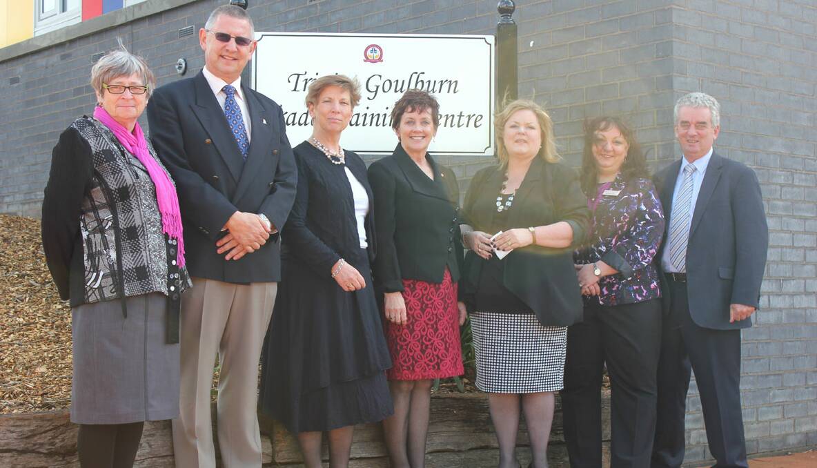 A WELCOME ADDITION: Maureen McGrath, Geoff Kettle, Moira Najdecki, Ursula Stephens, Mary-Jane Carroll Fajarda, Belinda Muir and Gary Dutaillis joined the official party for the opening of the Trinity Catholic College Trade Training Facility. 