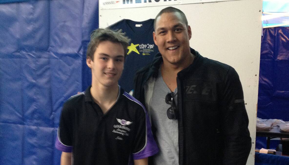 AUSTRALIAN IDOL: Jake Cooper met Olympian Geoff Huegill at the NSW Short Course Championships in Homebush this month. 