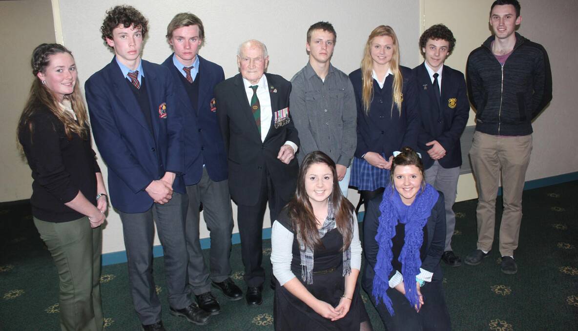 YOUNG LEADERS: Trinity students Tom Foley & James Croker, former Goulburn High student Brayden Fenwick and current Goulburn High students Maddison Cranston and Jackson Kofod posed for a photo with Kokoda veteran Bede Tongs (centre) and previous trekkers Jessica Hayes (left), Richard Joyce, Sarah Longhurst, and Ashleigh Craig (front) at the 2013 Kokoda Track Reception held at the Soldiers Club last Wednesday. 