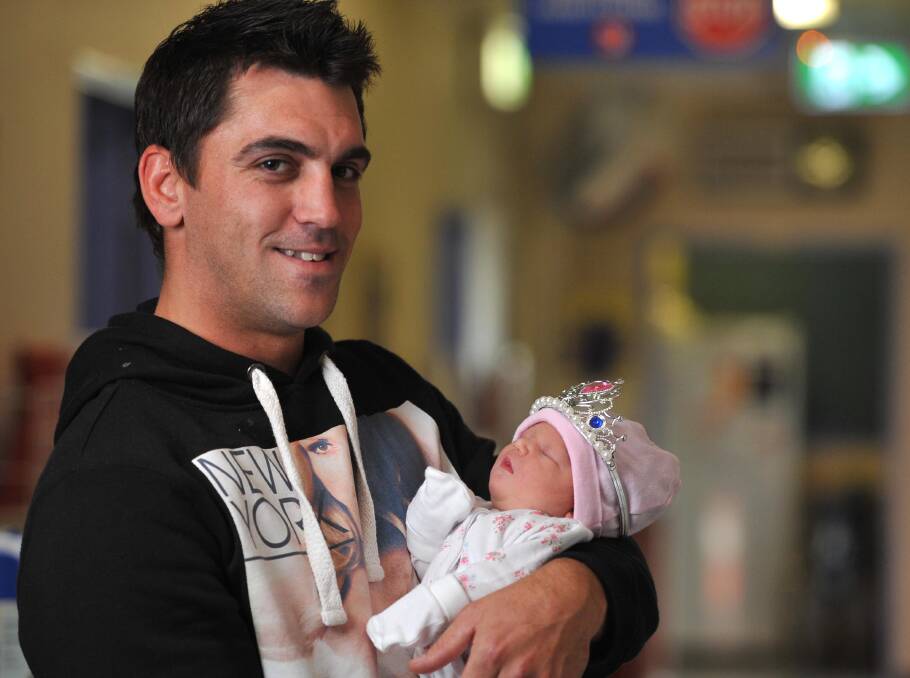 Ella Isobel James was born on July 23 at Wagga Base Hospital and is held by her proud father Peter James.