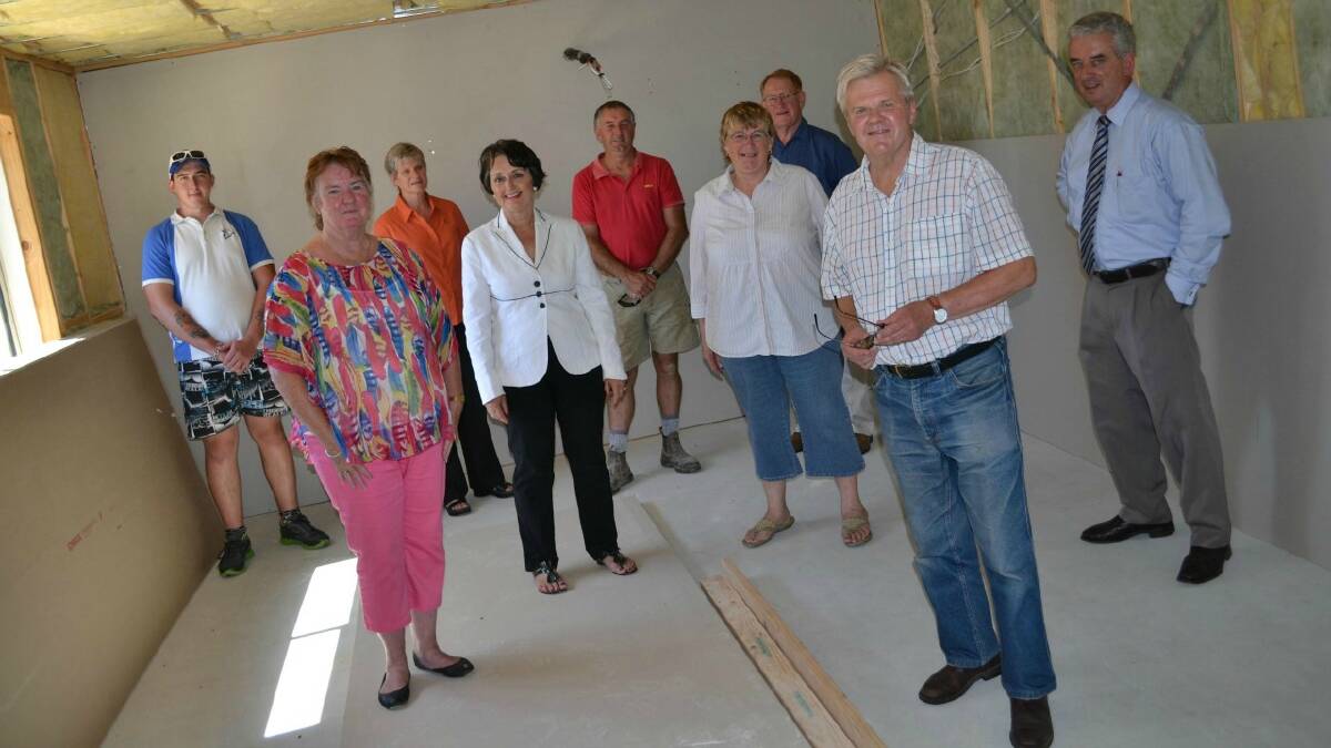 ON BOARD: Ethan Elford, Toni Mitchell, Wilbur Clarke, Bob Kirk, Judy Gray, Pru Goward, Ann Oliver, Fred Rainger and Gary Dutalis explored the soon-to-be completed training rooms.