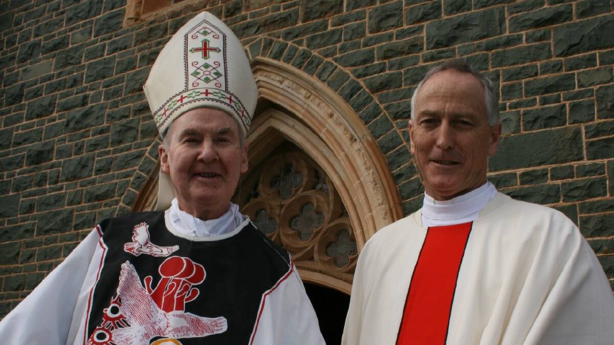 IN SUPPORT: Administrator of the Canberra/Goulburn Archdiocese, Monsignor John Woods (right) says a Royal Commission into child sex abuse should be broad ranging. He was pictured with retired Canberra/Goulburn Archbishop Francis Carroll in Goulburn last July. Photo: Louise Thrower.