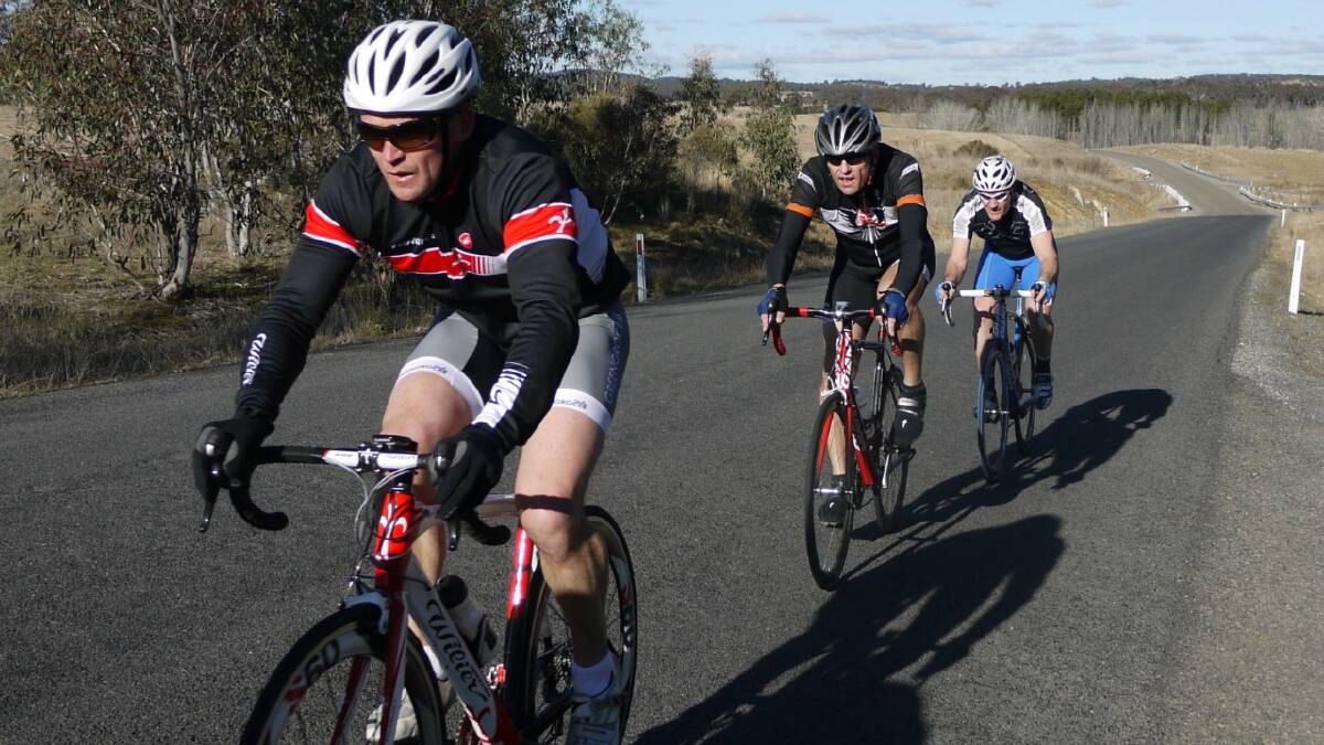  GRIND: Ricky Brooker leads Phil Hansen and Glen Allbon during Saturday’s 45km stage. Photo: Peter Redman.