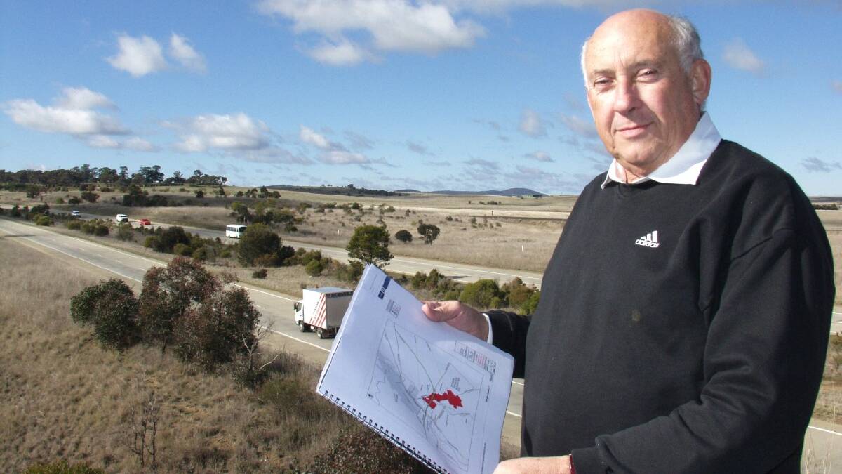  SIGN OF THE TIMES: Southern Distribution Hub project director Bob Stephens was optimistic about the development back in 2006, when he was pictured overlooking part of the land near the highway. The backing company was placed in receivership before Christmas.