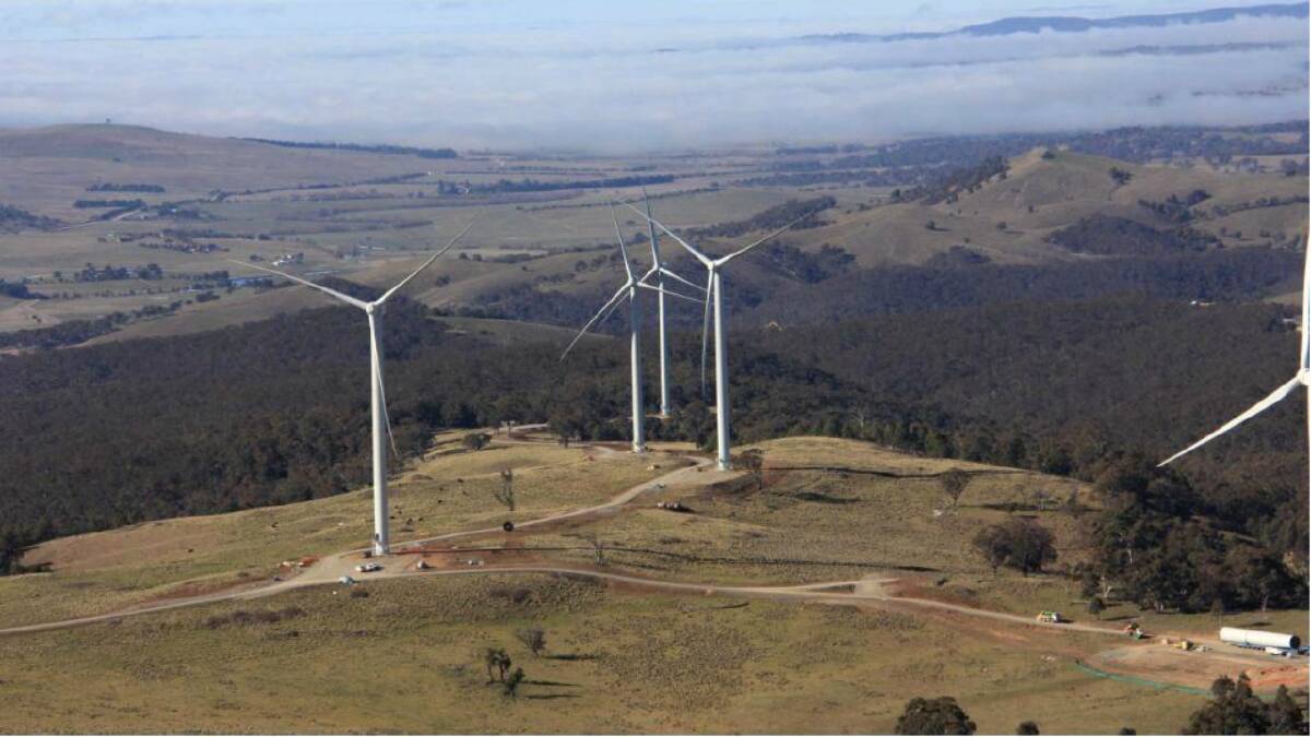    RISING ABOVE: The 73 turbine Gullen Range Windfarm is taking shape: Photo: Goldwind Australia 