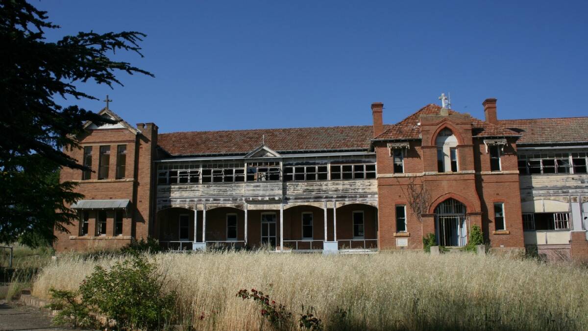  DETERIORATED: Owner John Ferrara wants to develop 15 residential lots on the southern side of the former St John’s orphanage in Mundy St. Councillors are concerned about the state of the 1912 building.