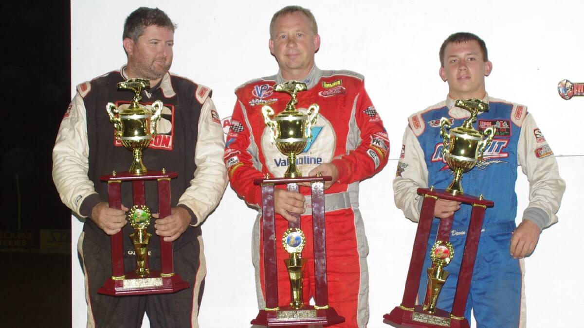  THREE, ONE, TWO: Michael Holmes from Perth, Steve Francis from Kentucky USA and fellow professional speedway driver Devin Moran from Ohio with their NSW Late Model Title trophies following the presentation by Ross Nicastri on Saturday night.