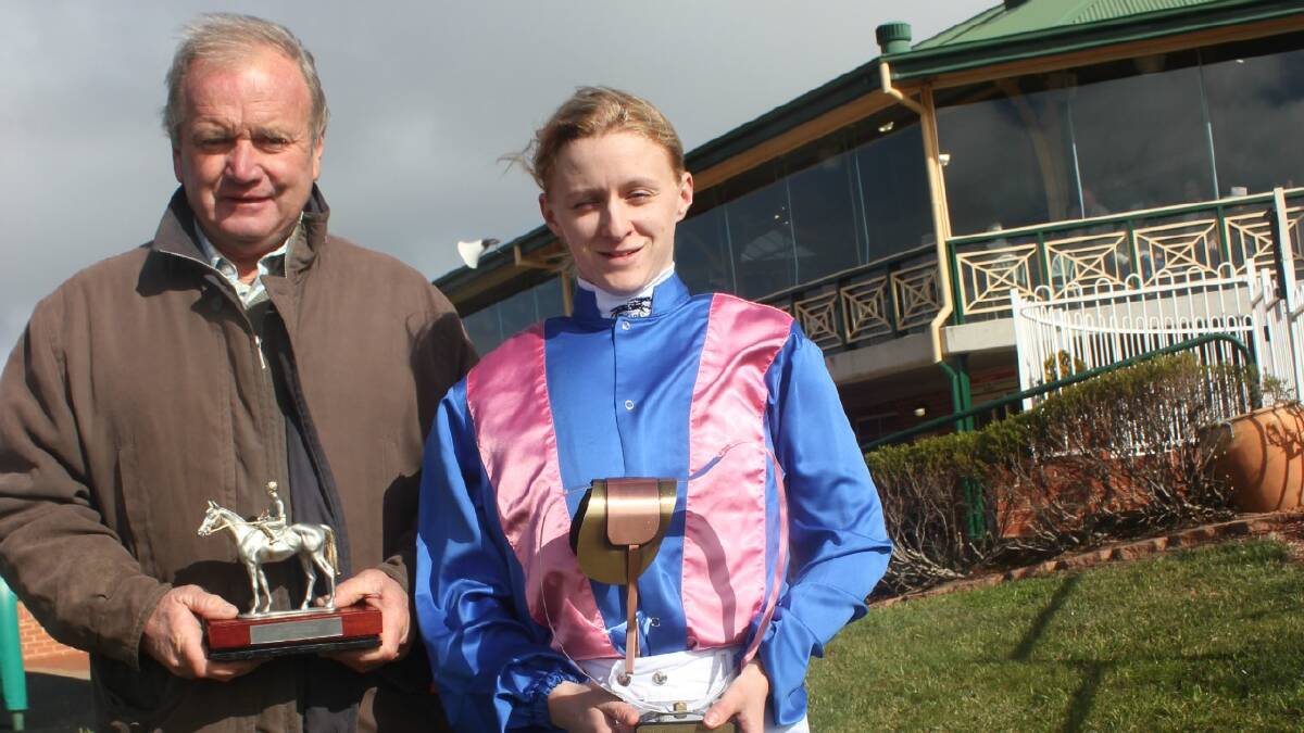   PREMIERS: Trainer Guy Walter and apprentice jockey Kayla Cross show off their silverware on Monday. (Inset) Ken Callaughan chats to Sky Racing after notching a hat-trick of wins.