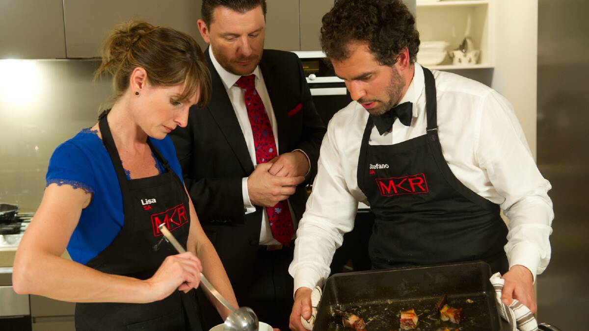 MKR: Manu watches over Lisa and Stefano as they prepare their meal. Photo courtesy of Seven