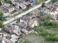 Buildings in the Ukrainian village of Ocheretyne, in Donetsk region, are damaged beyond repair. (AP PHOTO)