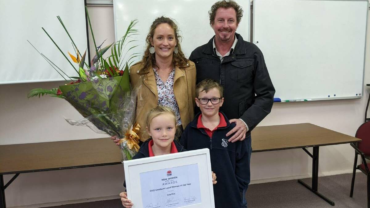 2022 Goulburn Woman of the Year Lou Fox with husband Ben and family. Picture: supplied
