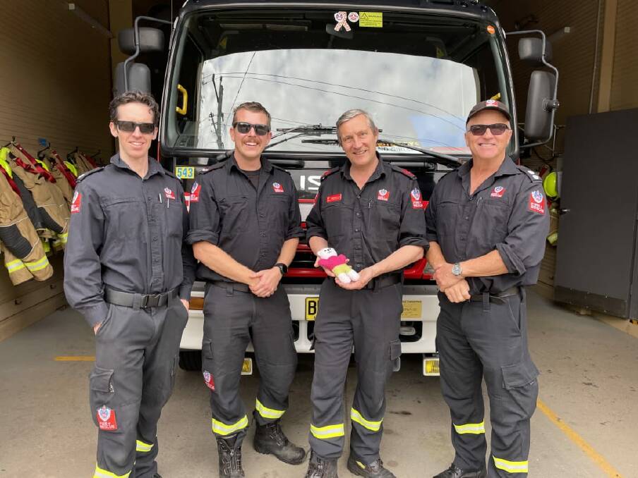 Leading firefighter Adam Reeson, qualified firefighter Stephen Edgar, firefighter Roberto Gnecchi-Ruscone and station officer Dennis Cornell went to a Bundanoon hotel to help a woman deliver her baby three weeks earlier than expected. Picture supplied 