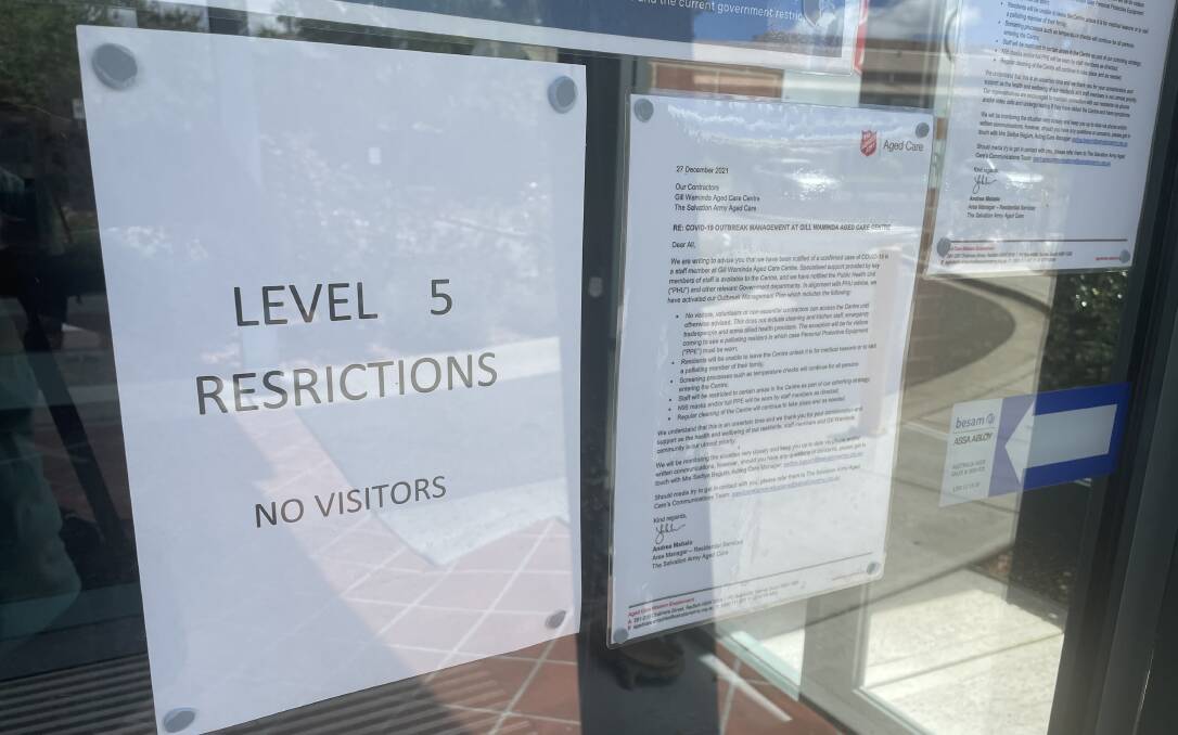 Letters and notices on the front door of Gill Waminda on the morning of Wednesday, December 29. Photo: Louise Thrower.