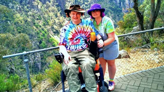 Joshua and Amber Richards enjoying a day out. A disability vehicle would greatly assits with more of these days. Picture: supplied