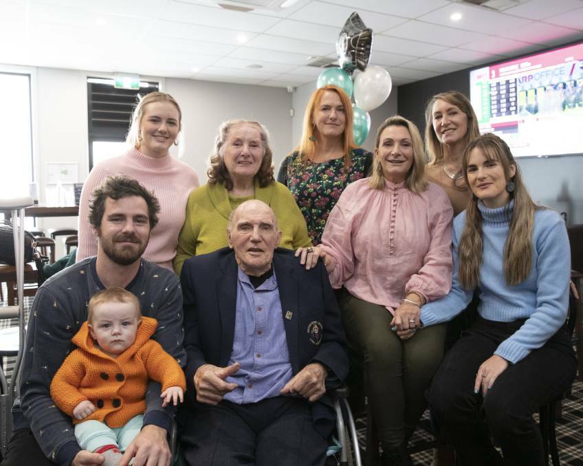 Phil Jackson with wife Ruth, grandson Sam and great-grandson Leo, granddaughters Hannah and Ellie and daughters Michelle, Susan and Lynn at his 90th birthday celebrations last month. Picture: Madeline Begley