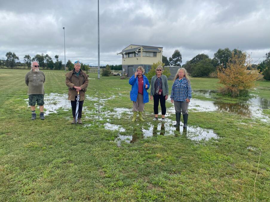 Goulburn Show Society members survey the conditions at the Goulburn Showground. Picture: supplied