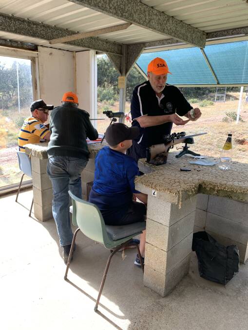 Visitors got to try out the 22. Caliber rifle on the historic range. Photo: Supplied