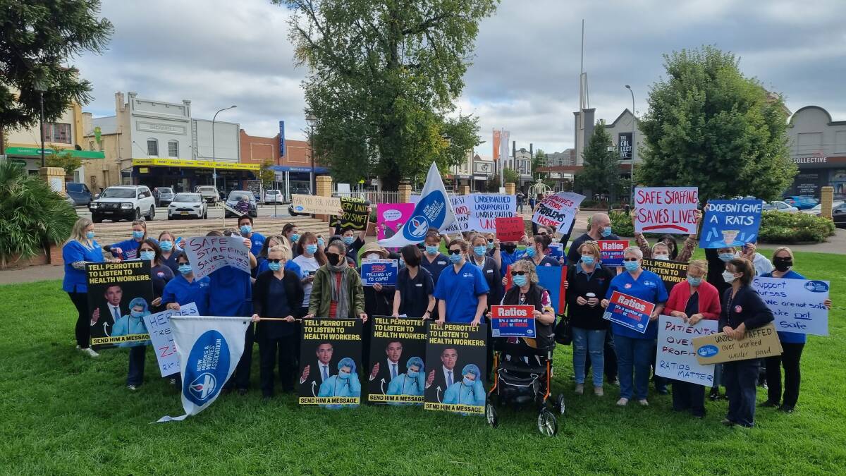 Nurses and midwives gather in Belmore Park. Picture: Dominic Unwin