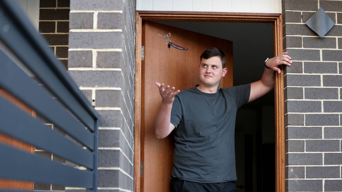 First home buyer Kai Grubb outside his townhouse in Taylor, which he recently purchased at the age of 20. Picture by James Croucher