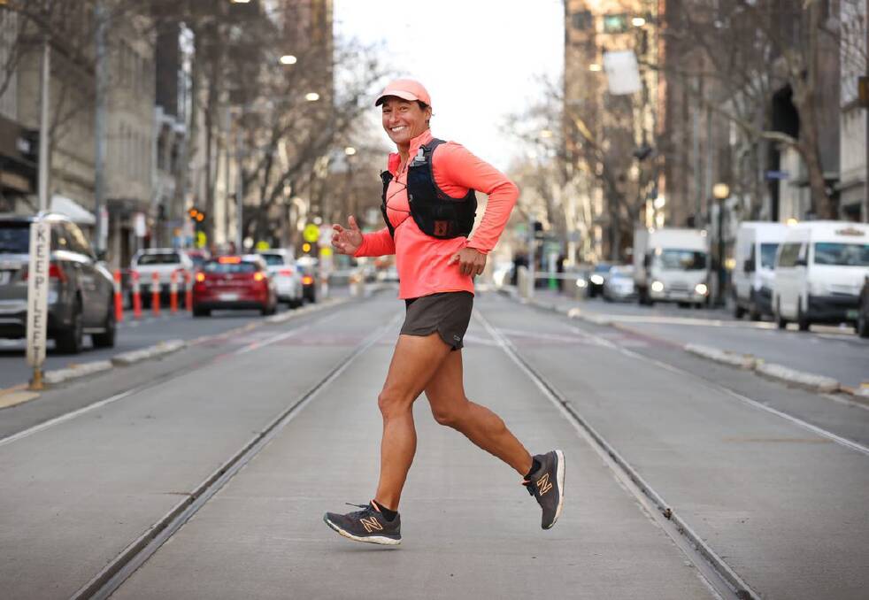 Marie Leautey running through the streets of Melbourne. Photo by David Card
