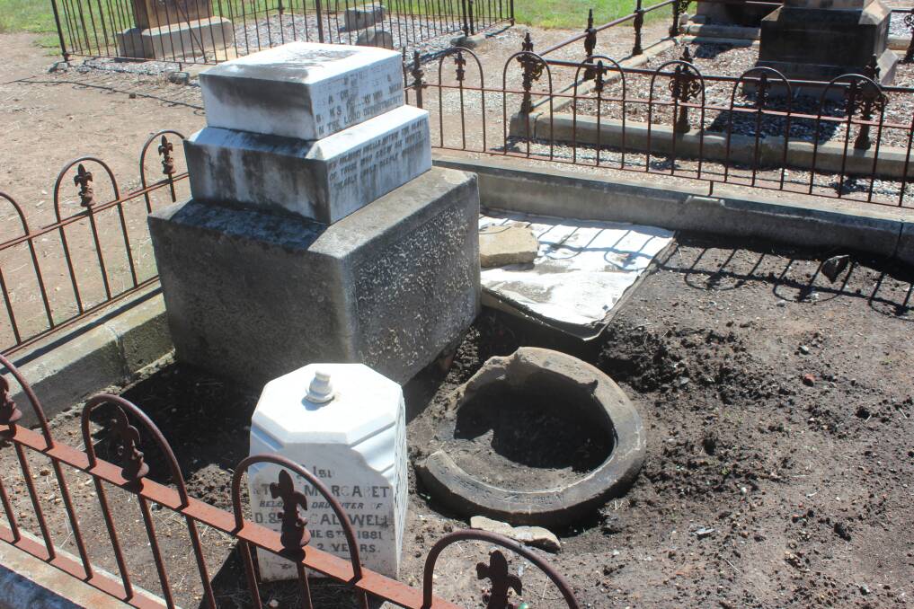 This grave was being restored by Friends of Goulburn Historic Cemeteries when they unexpectadly came across a stone pot. Picture: Sophie Bennett