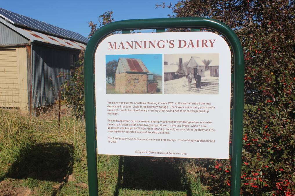 On this historical sign, Ms McGinity is pictured with her mother in the black and white photo. Photo: Sophie Bennett.