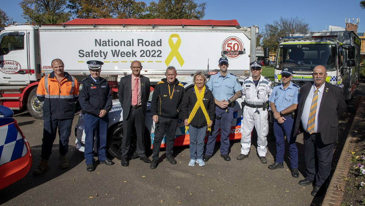 Representatives from Goulburn Mulwaree Council, Hume Police District, Transport NSW and Divall's Earthmoving and Bulk Haulage gathered in Belmore Park to mark National Road Safety Week. Photo: Supplied.