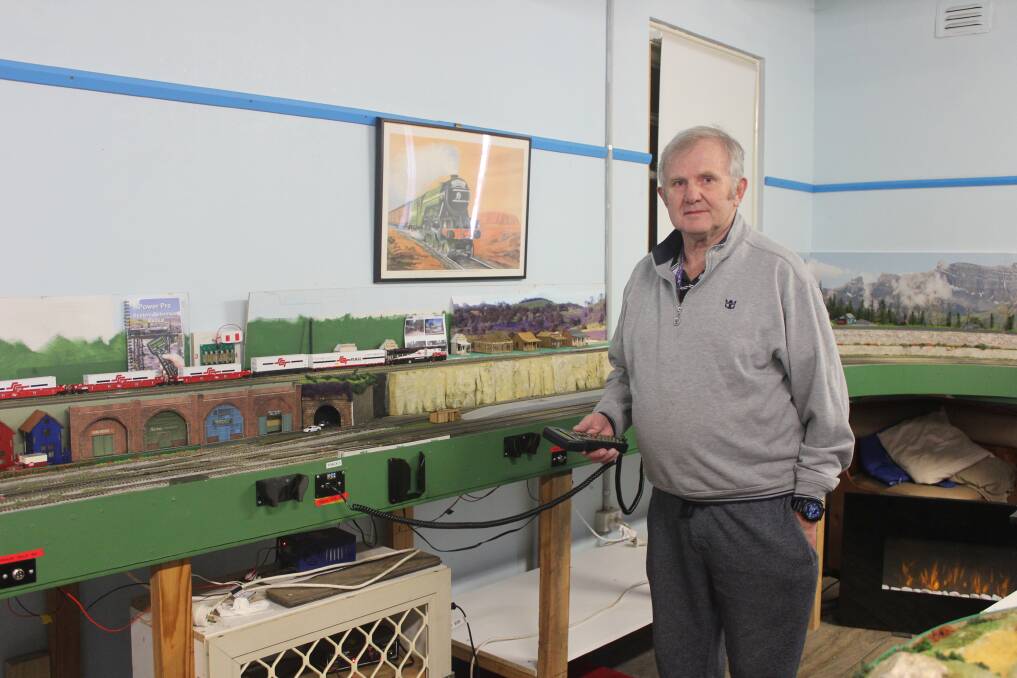 Chris Winkler with the train controller. Photo: Sophie Bennett.