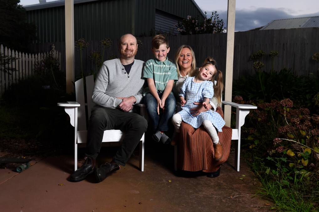 UPHILL BATTLE: Jarod Collins and Rhianna Fox with their children James and Odessa. Odessa has Jansen de Vries syndrome and is only one of two people in Australia who has the syndrome. Picture: Adam Trafford.
