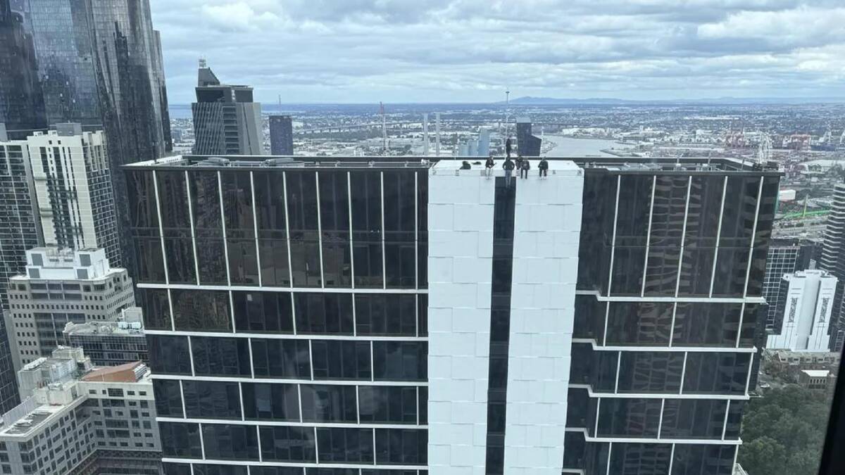 Six figures spotted on the roof of student accommodation in Melbourne CBD. Picture Umae_/Reddit
