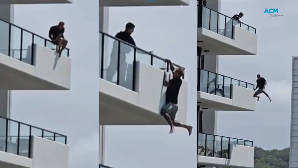 Onlookers filmed the man dangling from the apartment balcony before he plunged. Pictures Nine News