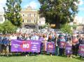 Dozens of people gathered in Belmore Park to raise awareness against domestic violence. Images by Jacqui Lyons. 