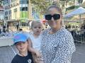 Bianca Manning, 43, with her two children outside Bondi Junction on April 15. Picture by Carla Mascarenhas