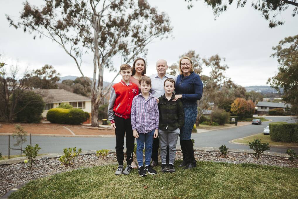 Dr David O'Rourke and his wife Sue-Ann at home in Garran with their children Jack 12, Lily 16, Tom 8 and Harry 8. Picture: Dion Georgopoulos