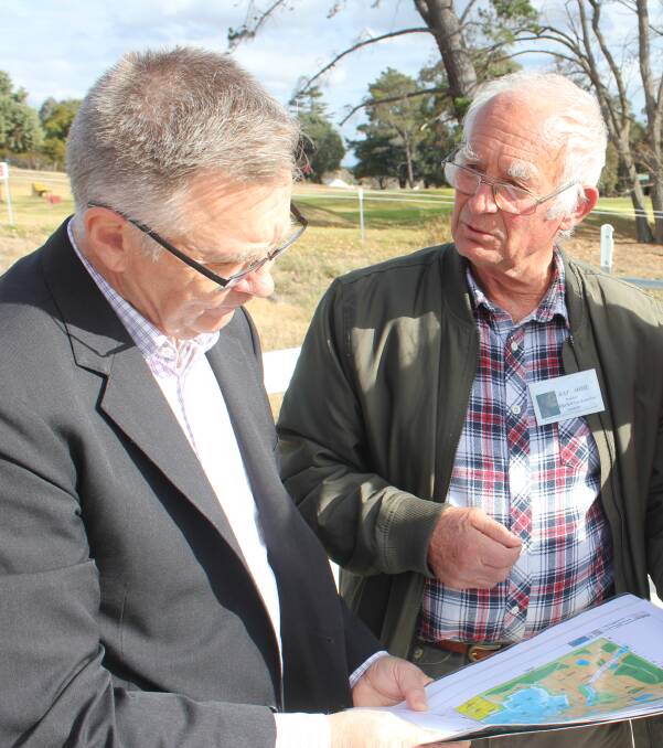 GRAND TOUR: Labor spokesperson for Lands Mick Veitch gets the rundown of the work done by FROGS Landcare group from president Ray Shiel. Picture: Baz Ruddick.