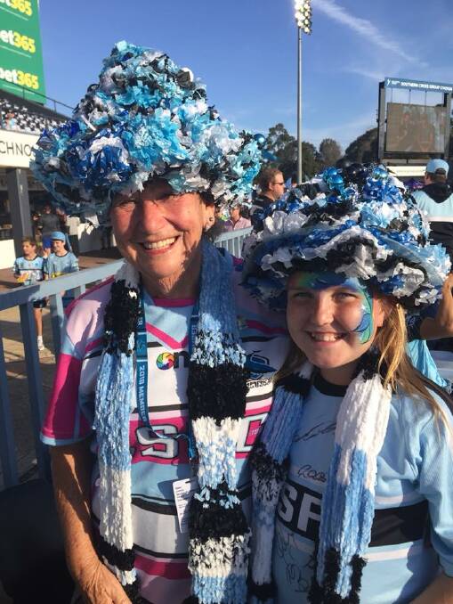LOUD, PROUD AND TOGETHER: Ms Justice and Isabelle. Ms Justice said many other Cronulla Sharks supporters had seen her social media post and were wishing her well in her search for her young mate. Picture: Supplied. 