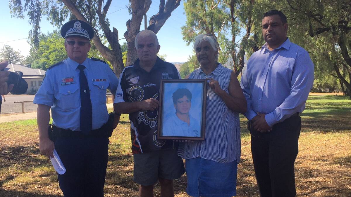 Fresh appeal: Oxley Chief Inspector Phil O'Reilly, left, with Stephen's father Stephen Smith, mother Margaret Smith and brother Jason Smith in Quirindi on Friday morning.