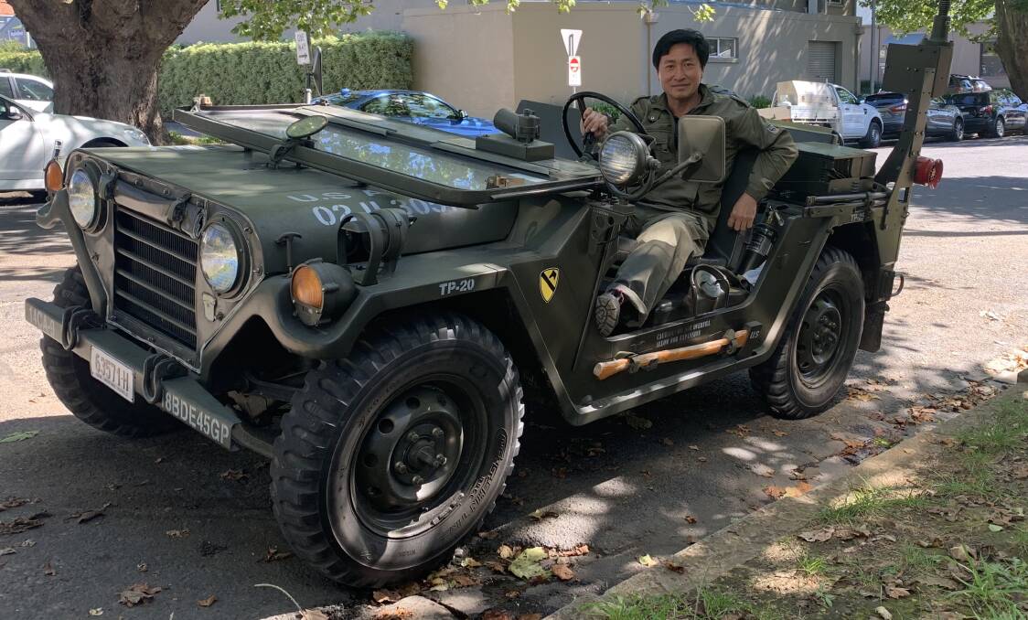 Vinh Tran in a jeep used in the Vietnam War. Photo: Matt Welch. 